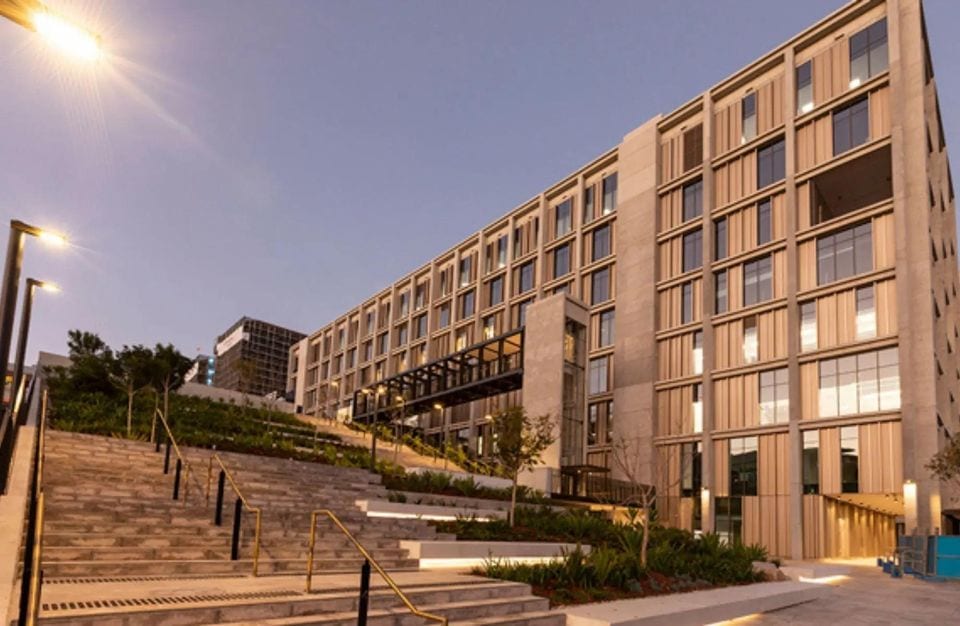 Queensland Cancer Centre: major hospital facility at dusk