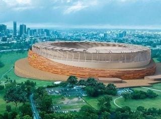 Broken Promises — architectural rendering of the proposed Victoria Park stadium precinct in parkland, with the city skyline beyond.